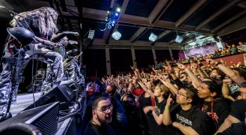 Sabaton & Kreator sabaton on stage with fans in photo