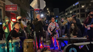 Out Front Street Bar at The UC Theatre Photo of Javier navarettes distanced band