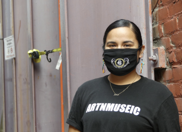 Photo of intern Abigail Armendaris with mask on