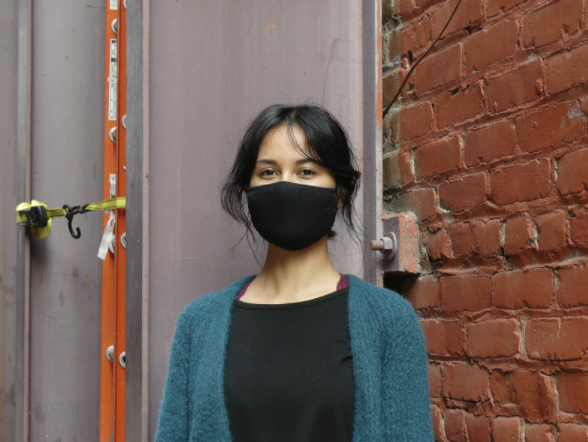 Photo of intern Gabriela Velez with mask on