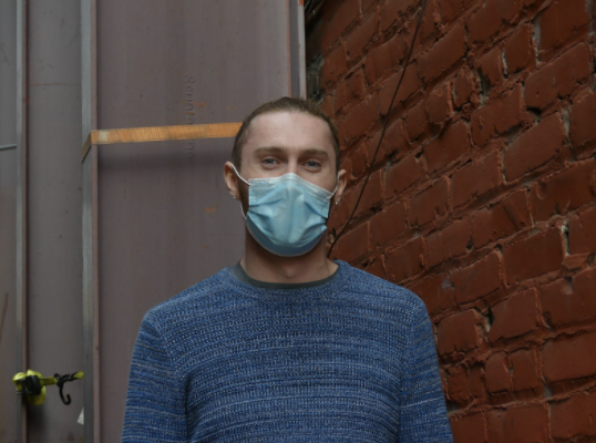 Photo of intern Hudson Howard with mask on