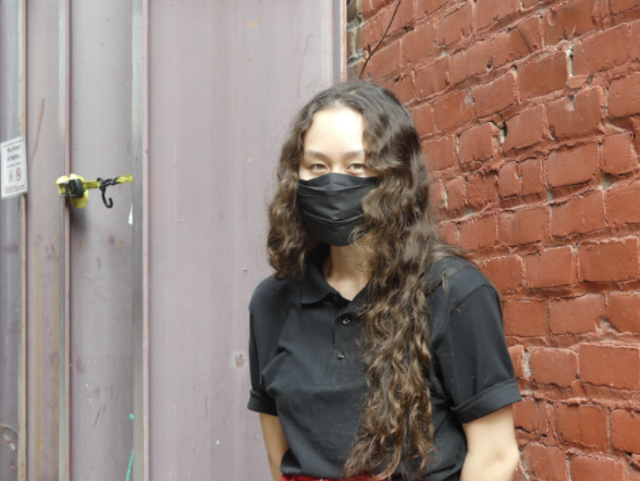 Photo of intern Naya Ngyuen with mask on