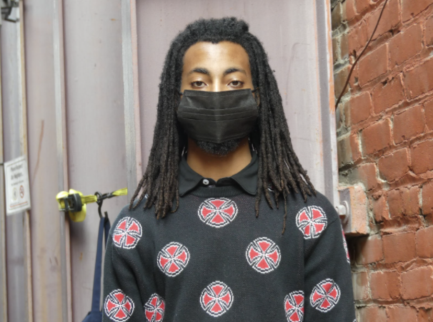 Photo of intern Omar ali with mask on